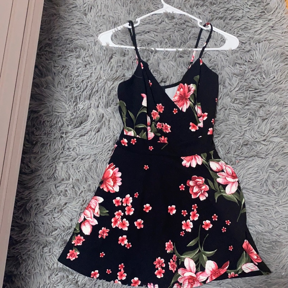 This is a flower romper that looks like a cute dress(worn once)
